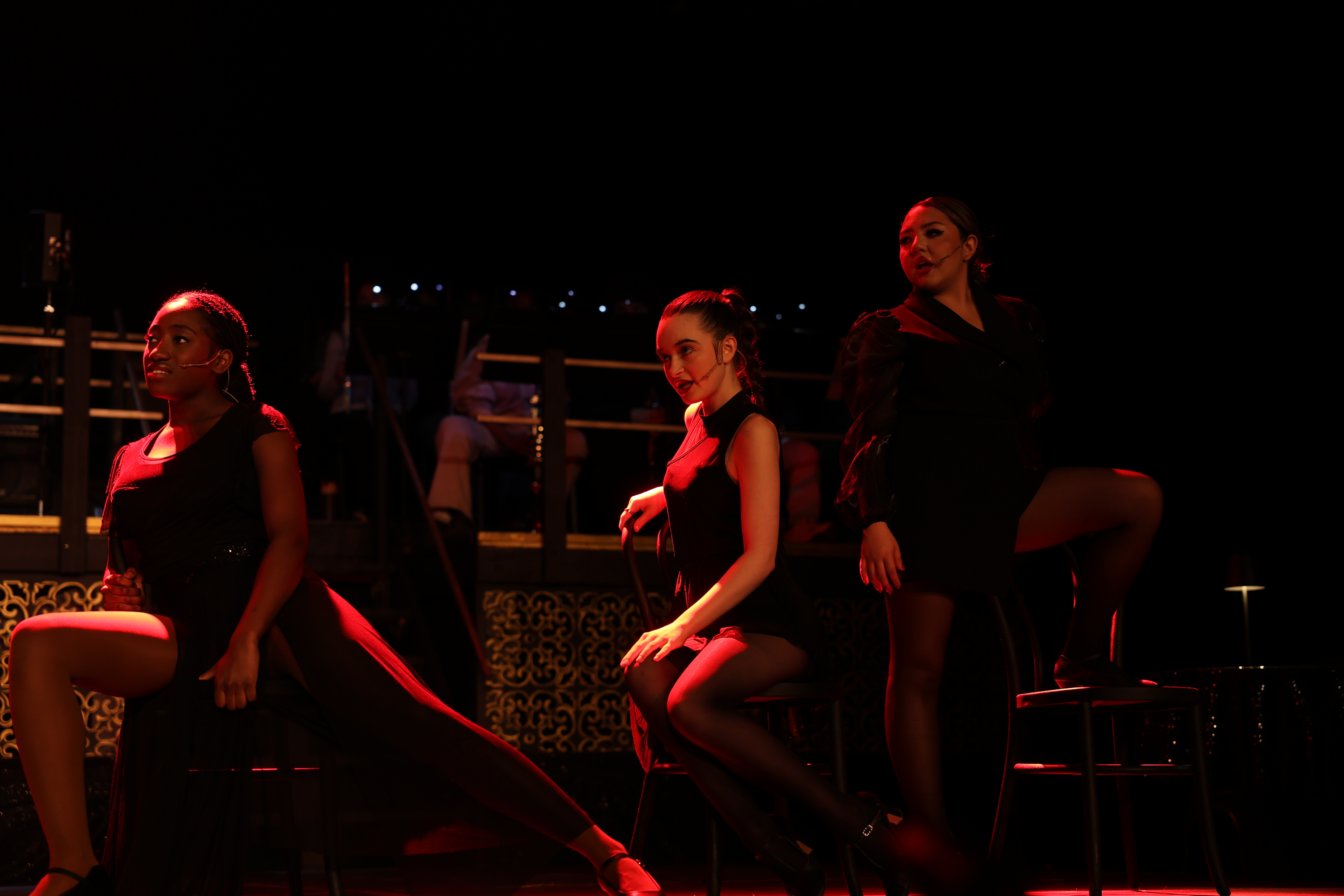 A photo of our preformers doing Cell Block Tango from Chicago