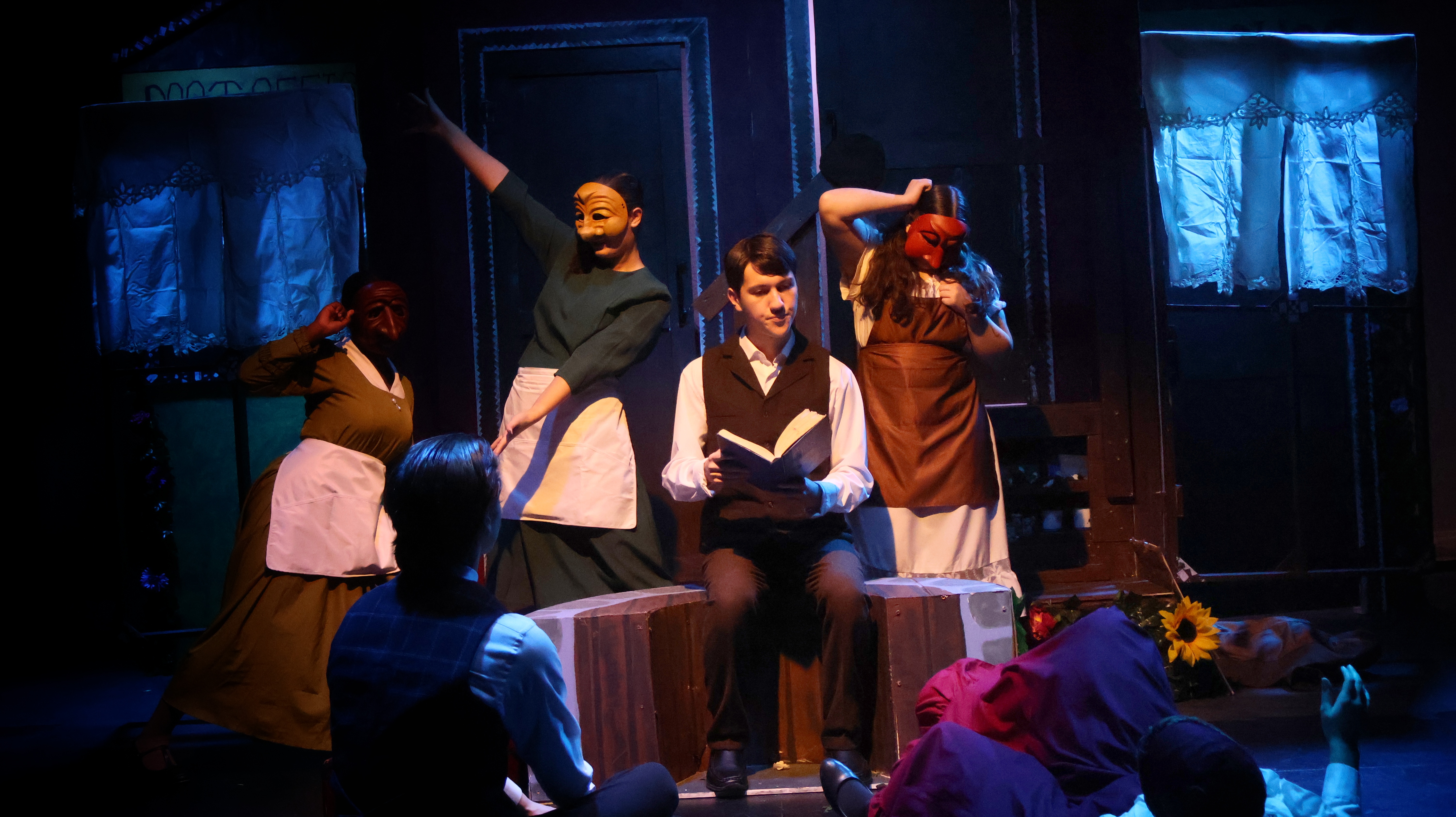 A photo of our preformers doing a scene from Fools